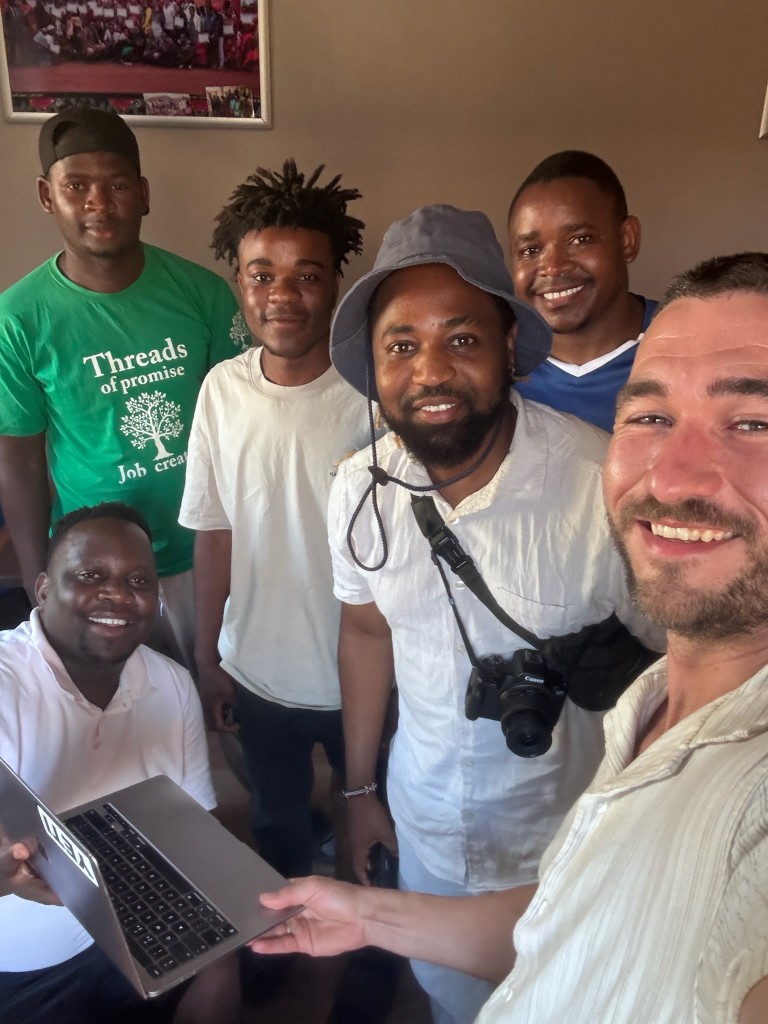 Seeds of Promise team with laptop and camera equipment
